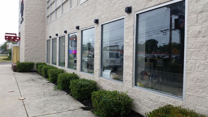 Row of aluminum-framed storefront windows
