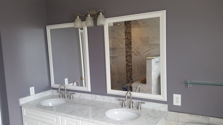 Residential double vanity with framed mirrors
