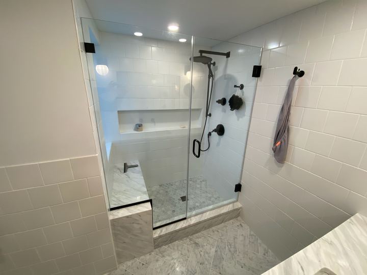 Glass shower enclosure